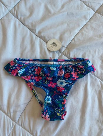 Bas de maillot de bain enfant fille bleu volant motif fleurs Penti taille 5/6 ans neuf
