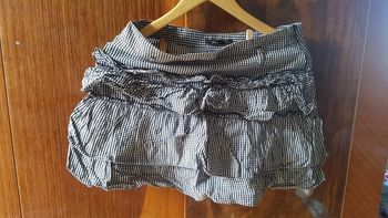 Jupe courte plissée petits carreaux couleur noir et Blanc