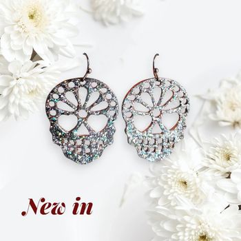 Jolies boucles d'oreilles motif skull