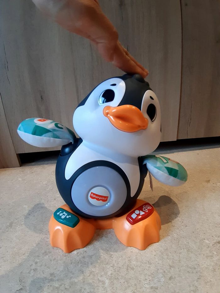 Jouet d'éveil interactif et musical pingouin fisher price - photo numéro 2