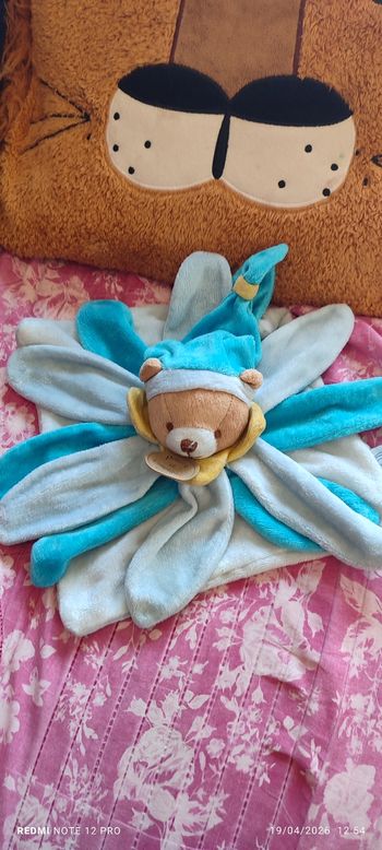 Doudou ours fleurs doudou et cie 