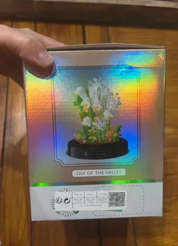 Bloc de construction fleurs dans une cloche