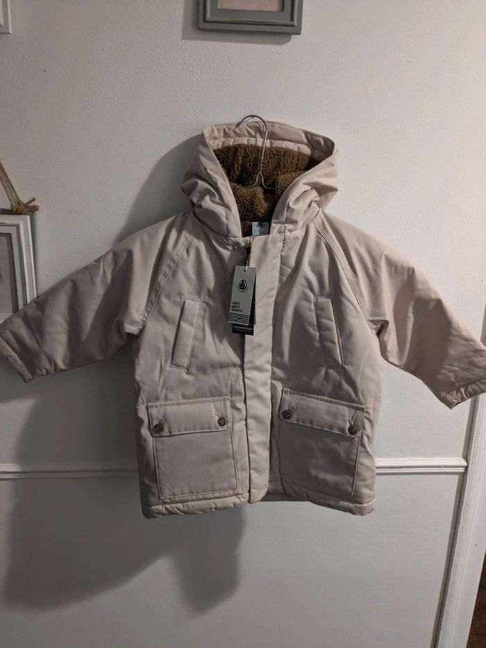 Manteau fourré moumoute 5 ans fille rose pâle