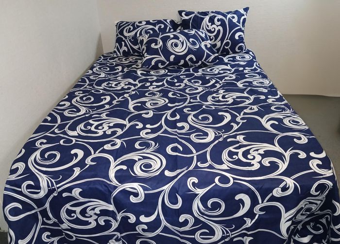 Drap de lit avec 4 taies d'oreiller