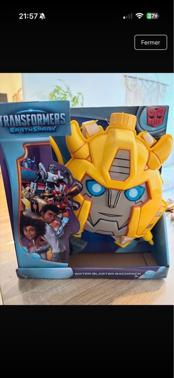 Pistolet sac à dos transformers neuf 