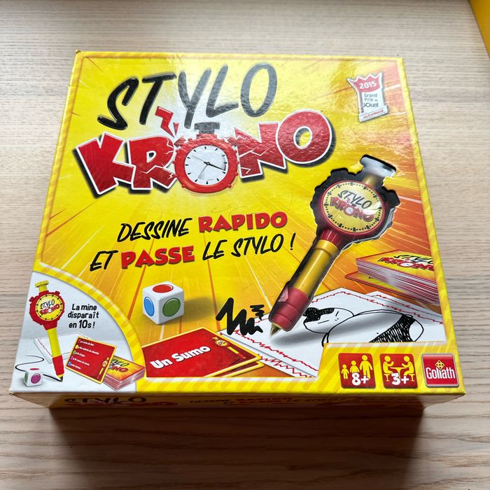 Goliath, stylo, chrono, dessine rapido et passe le stylo