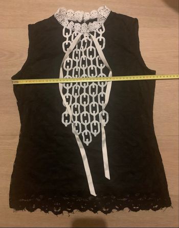 Beau top class et vintage taille 38 en dentelle noir et blanc