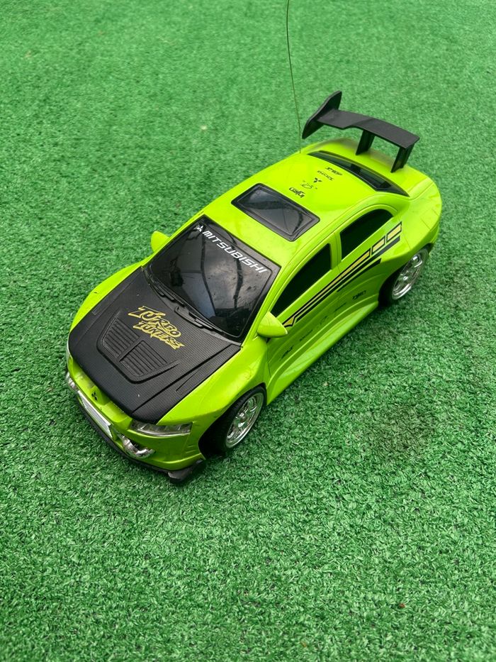 Voiture télécommandée Mitsubishi Turbo Tuners – 28 cm (aileron abîmé, télécommande absente) - photo numéro 2