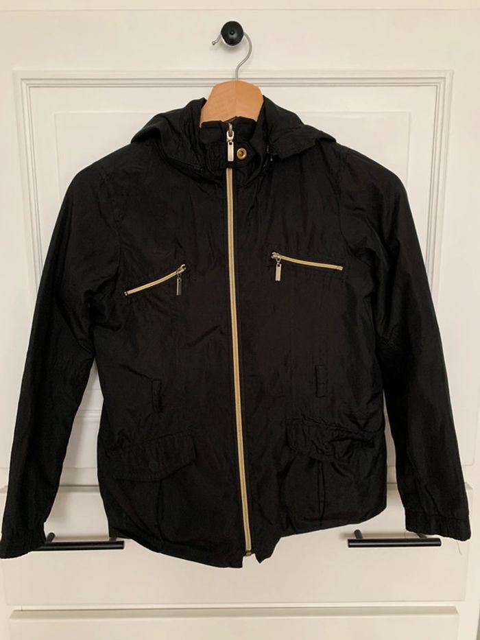 Kway noir pour fille 7-8ans .