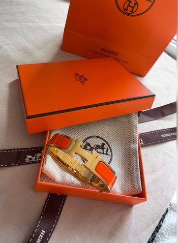 Bracelet Hermès Clic H – Orange & Doré (Neuf avec boîte, étiquette et ruban)