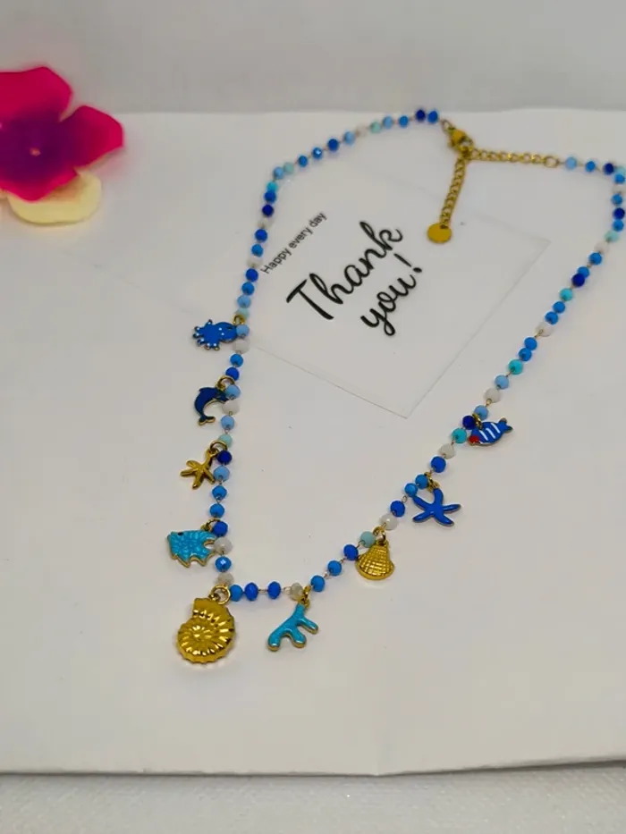 Collier doré et bleu avec perles de cristal et breloques de la mer - photo numéro 5