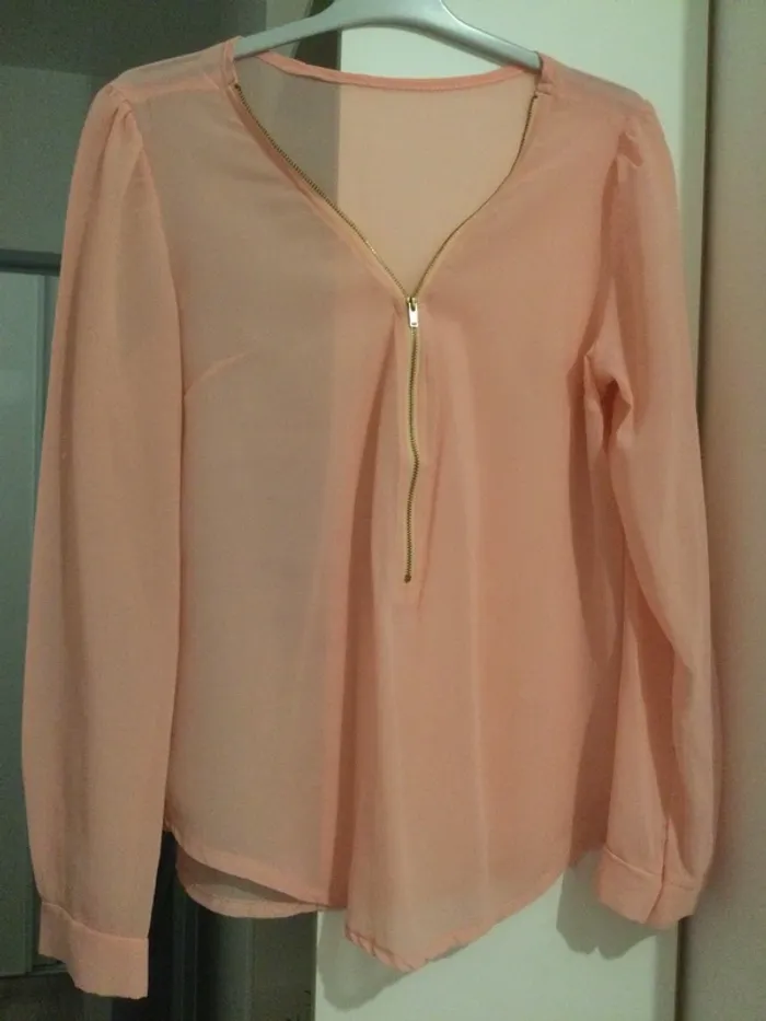 Blouse transparente rose clair taille 38