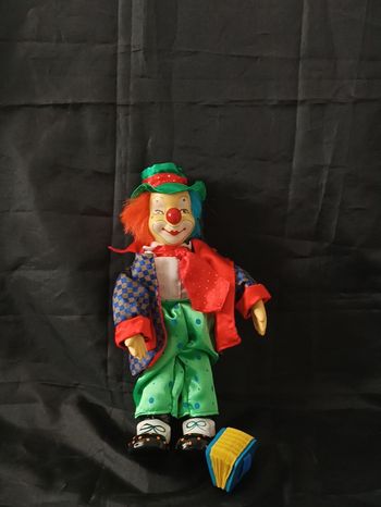 Clown musical porcelaine