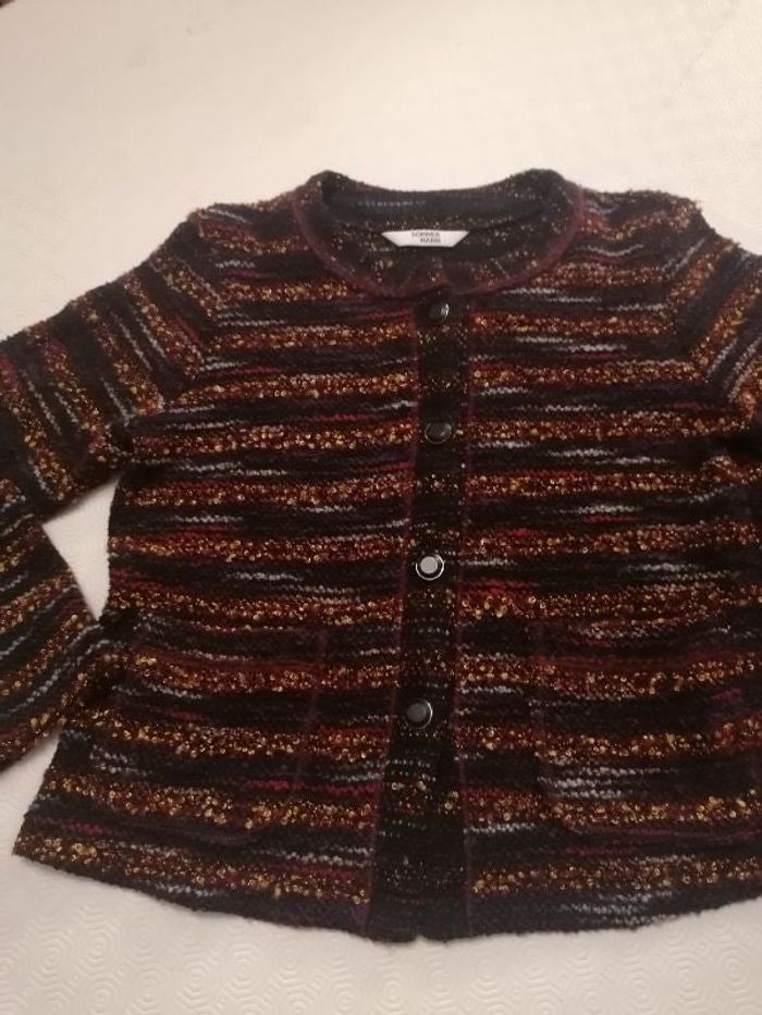 Joli gilet belle qualité de tissus poche de chaque côté comme neuf