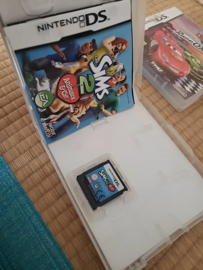 Lot de 4 jeux Nintendo DS cars, sims 2, quête d'Olaf et Lego - photo numéro 5