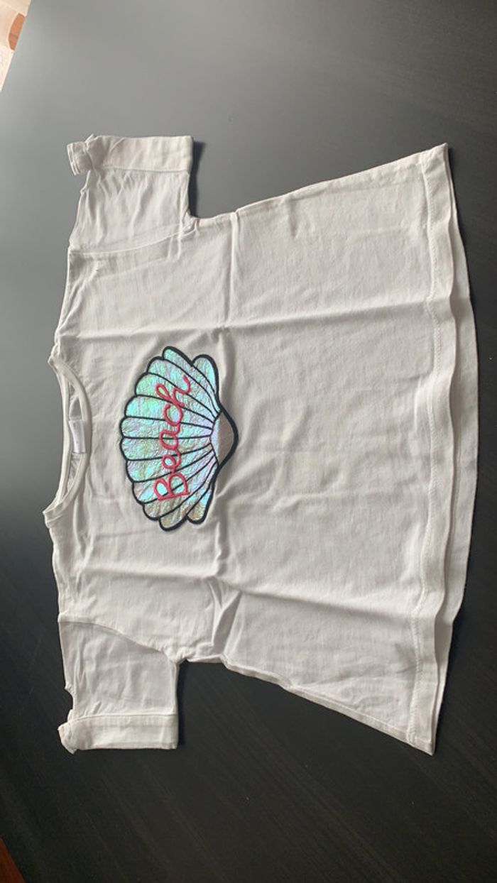 T-shirt blanc avec noeud sur les manches