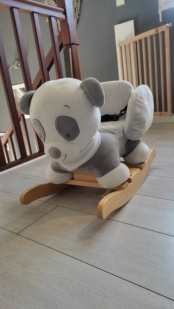 Chien ou panda à bascule