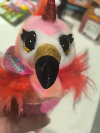 Peluche coco surprise neuve