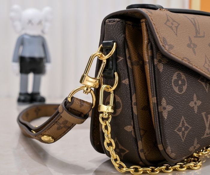 Louis Vuitton East West Métis  M46279 - photo numéro 5