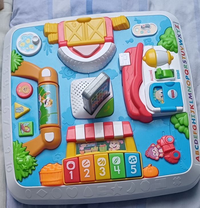 Fisher-Price Table d'activité table de jjeu éducative
Français et Anglais
