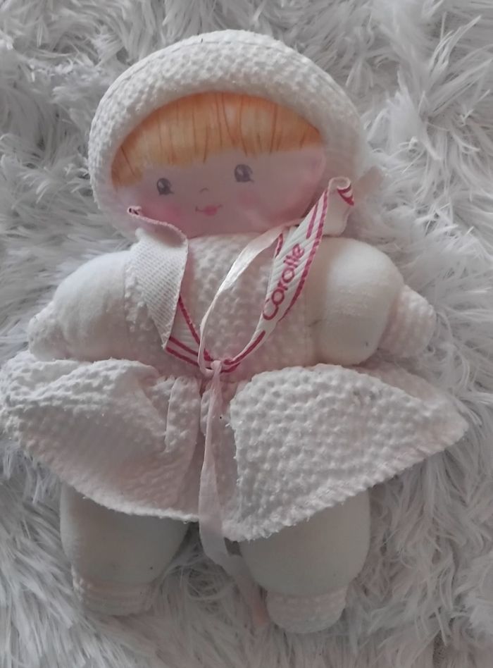 Doudou poupée chiffon de couleurs blanc et rose -Corolle