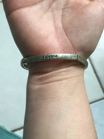 Bracelet métal argenté élastique bon état