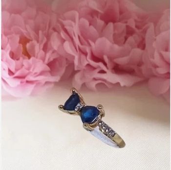 Bague Plaqué or avec un noeud en pierre bleue et strass taille 17 ou 54
