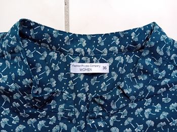 haut bleu marine à motif état neuf