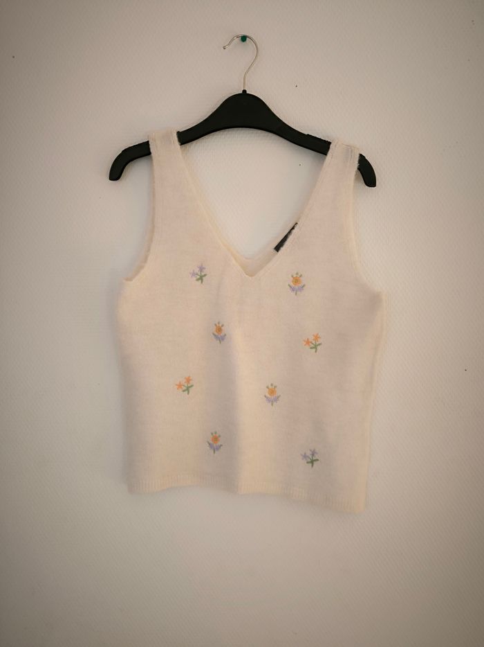 Pull sans mache beige avec fleurs