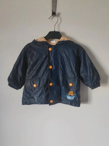 Imperméable capuche bleu marine jaune