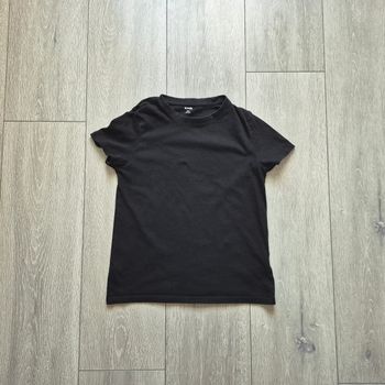 Maillot manche courte uni noir. Garçon 10 ans. Marque Kiabi 