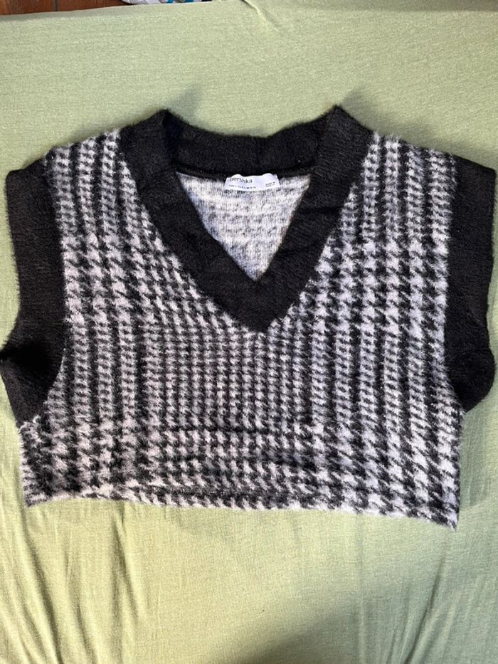 pull sans manches court