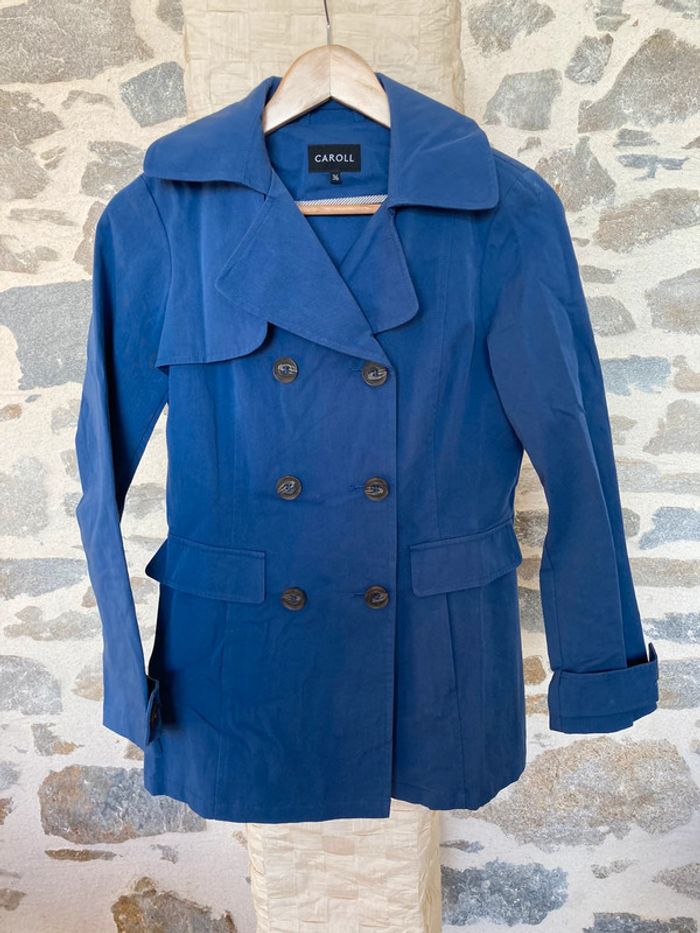 Trench Caroll
