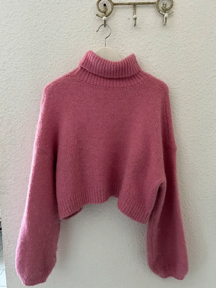 Pull col roulé rose