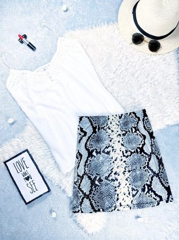 Jupe moulante effet peau de serpent-T.S ou T.36 🖤