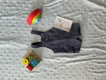 salopette short bleu pressions entre les jambes 12 mois kiabi