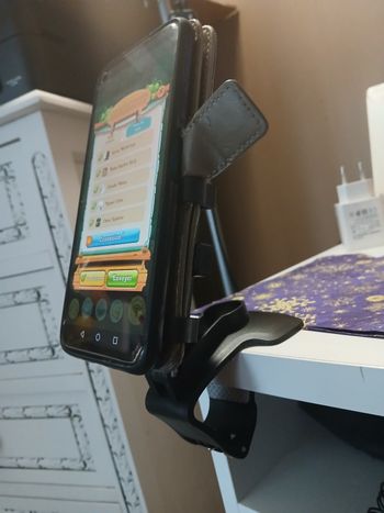 Support de téléphone neuf.