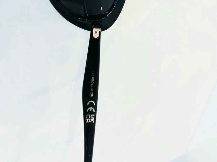 Lunette de soleil femme noire ovale UV protection catégorie 3 - photo numéro 6