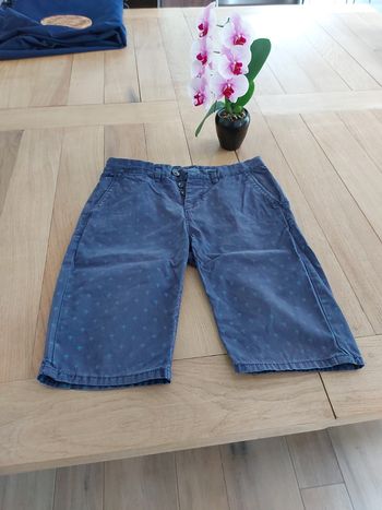 Short bleu avec palmiers