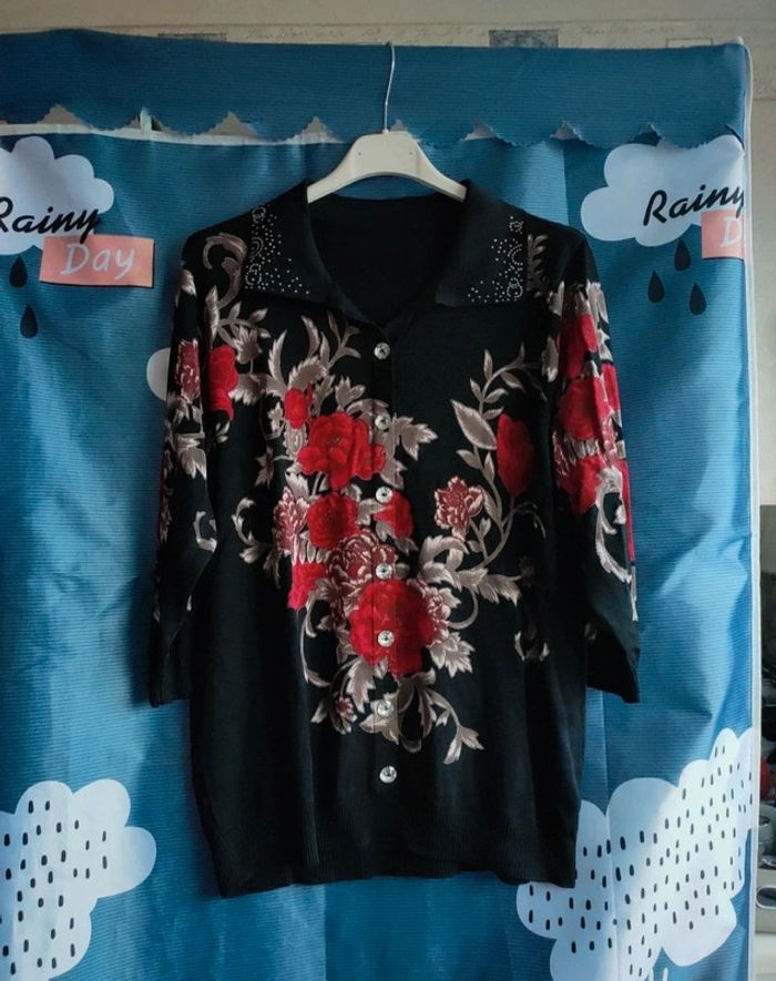 Polo en pull manches trois-quarts