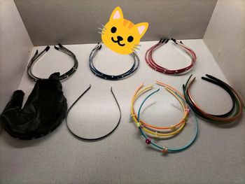 Lot 16 serre tête  et un serre tête noir