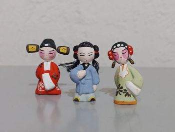 3 figurines asiatiques 