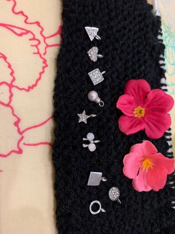 9 breloques argentées