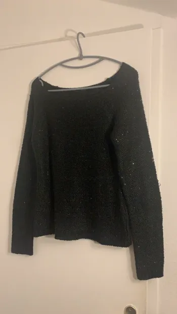 Pull pailleté.