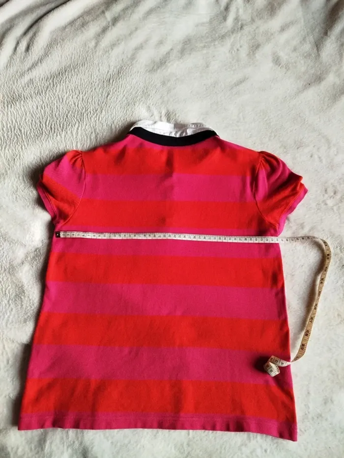 Polo femme Lacoste orange et rose avec col blanc - photo numéro 8