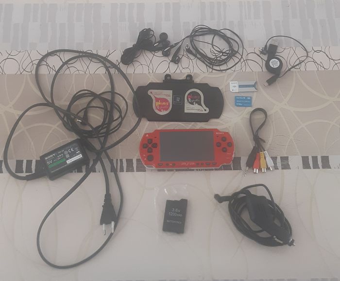 PSP Slim & Lite + Jeux + Films - photo numéro 2