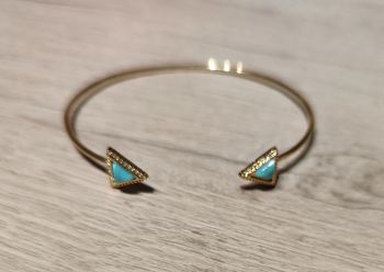 Bracelet doré avec pointes de flèches bleu turquoise