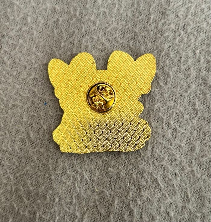 Pin’s Pokémon Ronflex et Papilusion - photo numéro 2