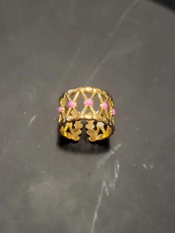 Bague acier inoxydable doré croisillons points roses
