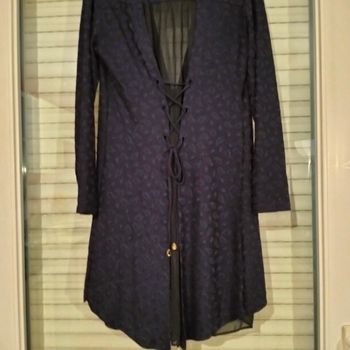 Gilet avec des détails de dentelle en très bon état